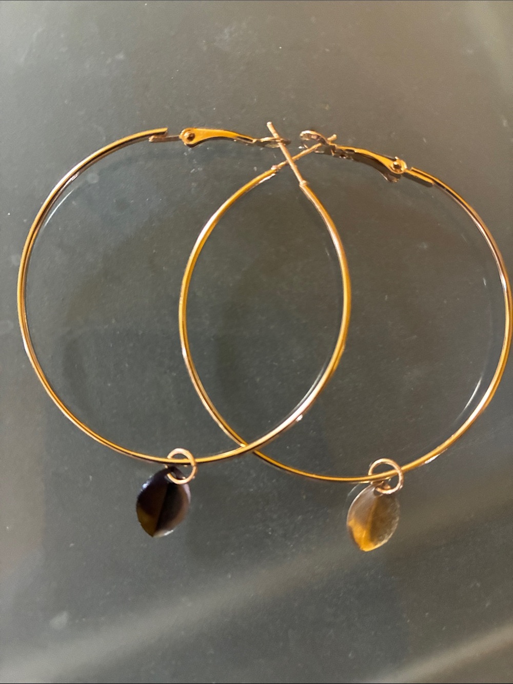 Lightweight hypoallergenic 50mm gold tone ear rings with two tone leaf pendants